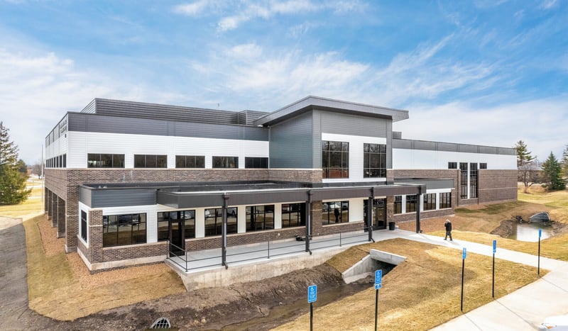 Modern U.S. nursing home facility with two-story design and landscaped surroundings, reflecting contemporary senior living architecture.
